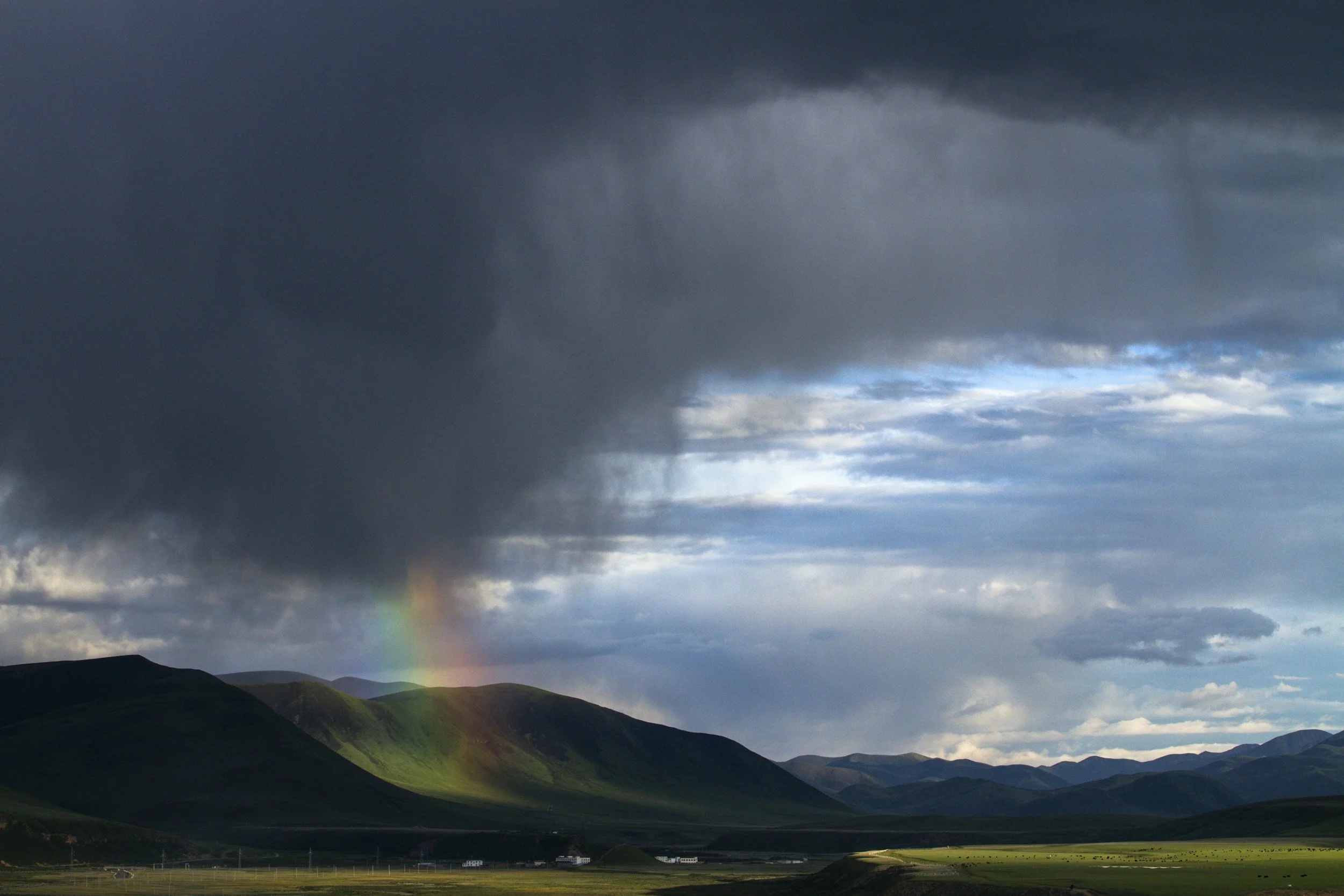 Storm with light breaking through, symbolizing trauma as injury rather than defect, betrayal trauma