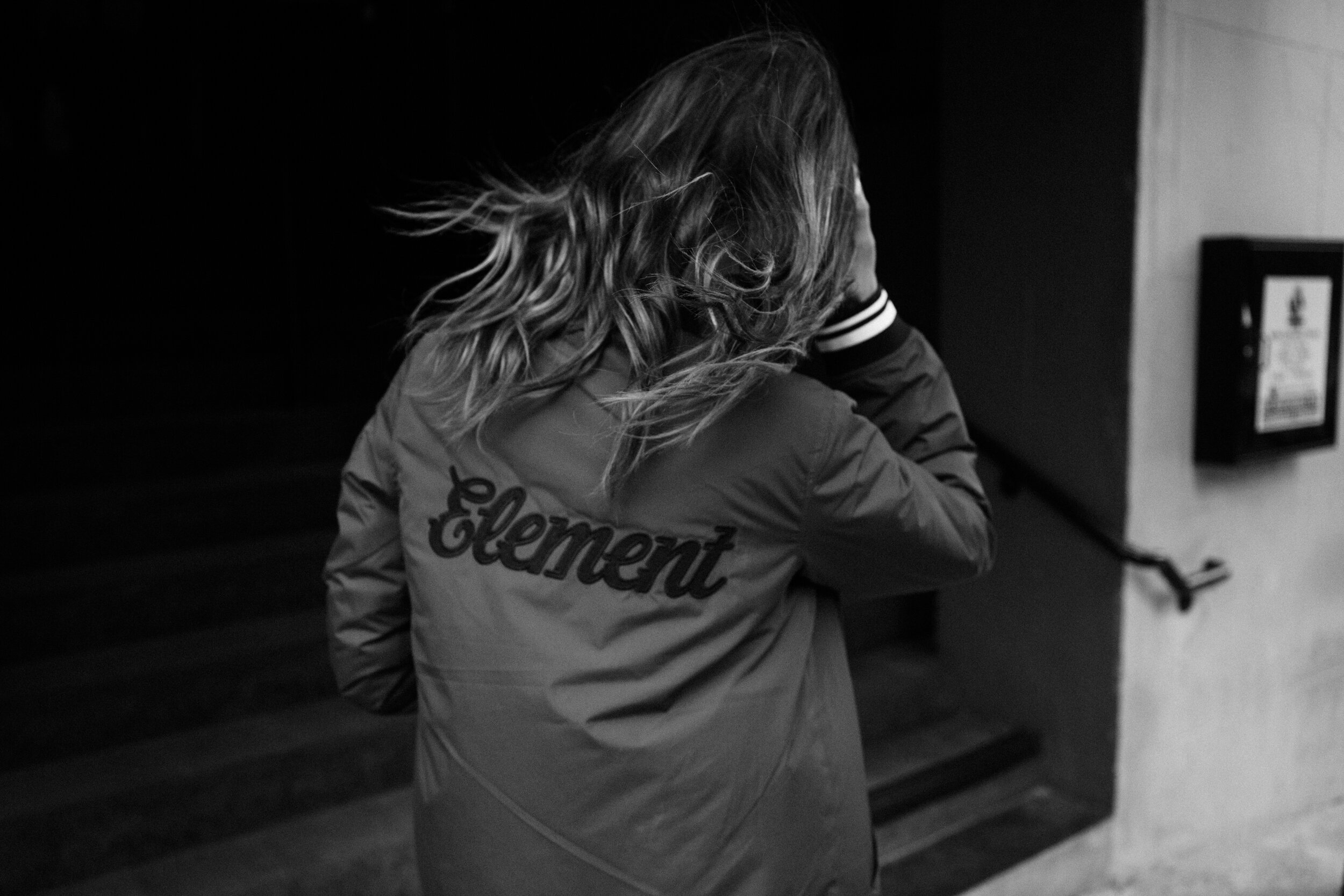 womens hair blowing in wind wearing element jacket