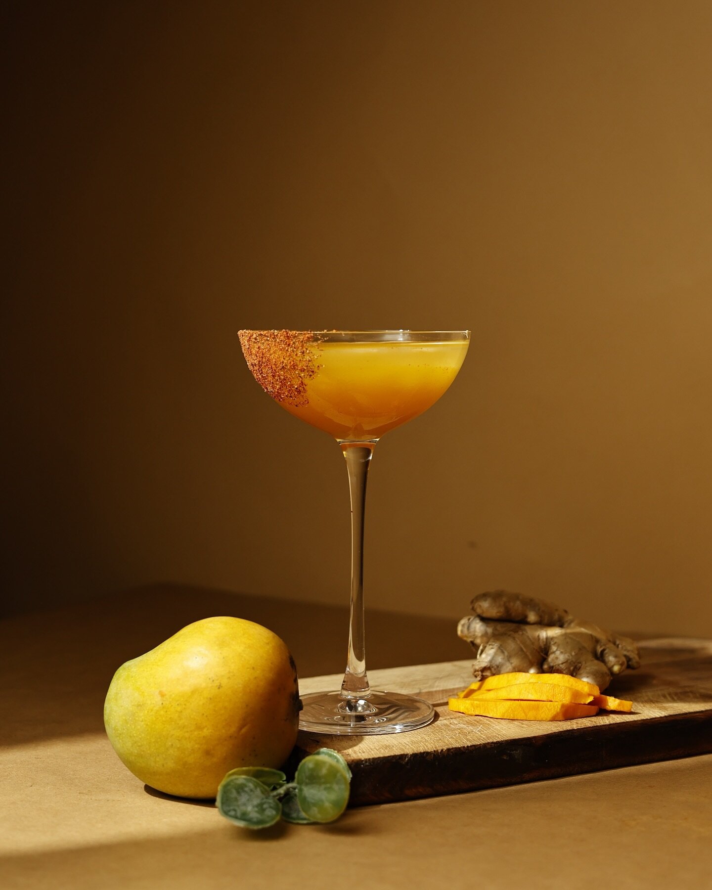 The Mango Ginger Margarita - the perfect harmony of sweet mango and fiery ginger. 

RECIPE:
40ml Tequila Blanco 
20ml Kaveri
20ml Fresh Lime Juice 
20ml Mango Pulp* 

Rim either a martini glass/coupe or a rocks glass with a salt/chaat masala mix. If 