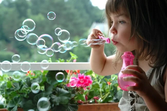 GIRL-BLOWING-BUBBLES.jpg