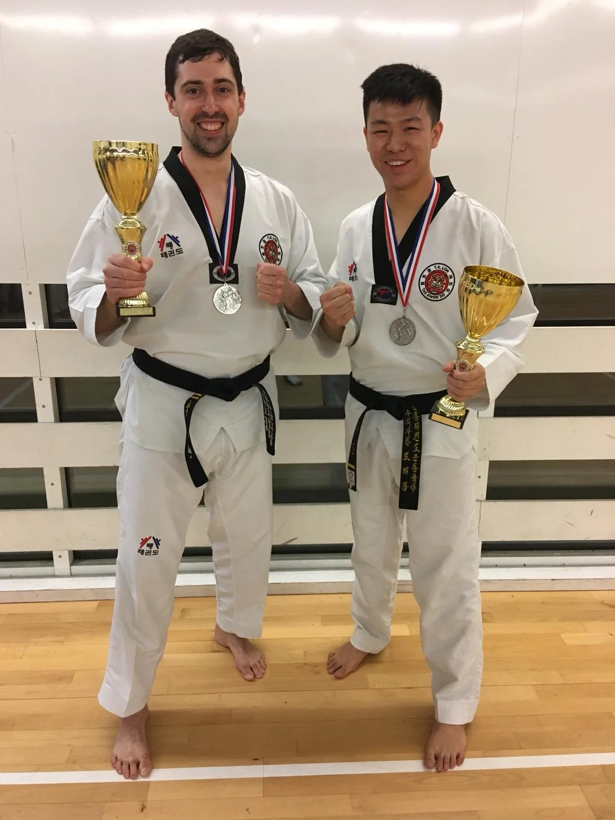 Mr Cornwell and Matthew with their trophies