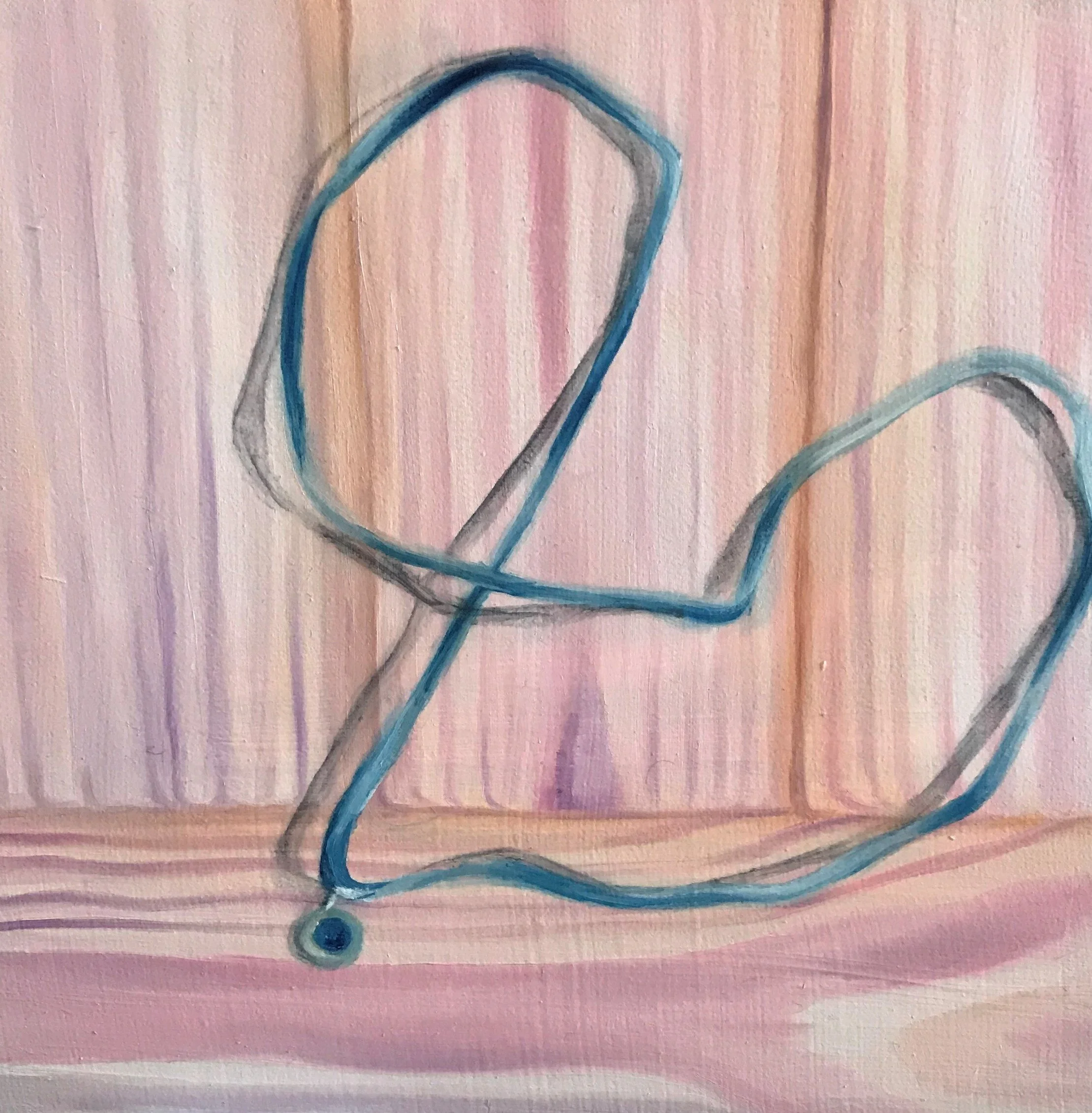 Blue Necklace on Pink Wood