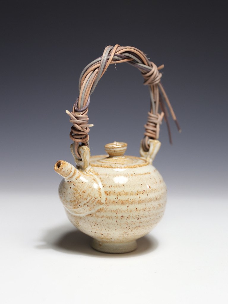 Handmade Ceramic Teapot with Eye Catching Style & Rope Wrapped Handle