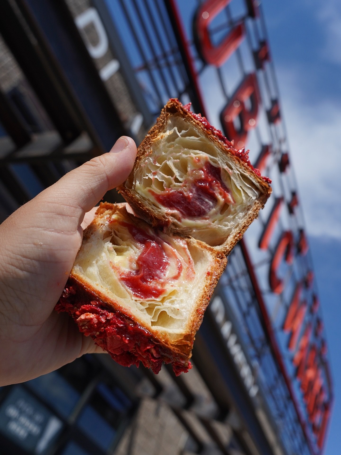The pink pony cube (not so pink, but close 😅) - filled with Elderflower English cream and strawberry jam, topped with a field of freeze dried strawberries.