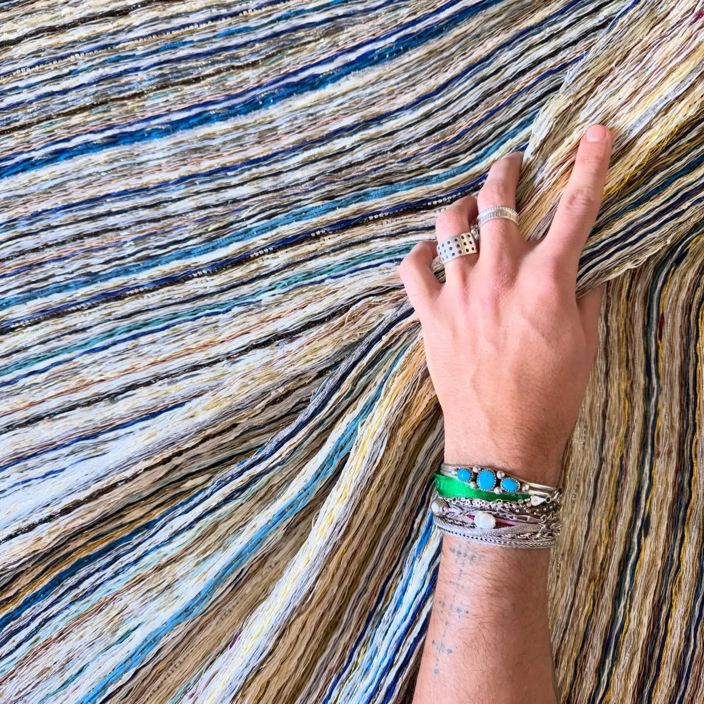 TOTEM, A WALL&rsquo;S JEWELRY&mdash;

Rooted in textile traditions yet expanding far beyond fiber, my practice embraces materials not typically associated with weaving. From 24k gold to rubber and salvaged industrial remnants, each wall-based panel i