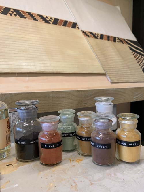 Jars of pigments used in the artwork