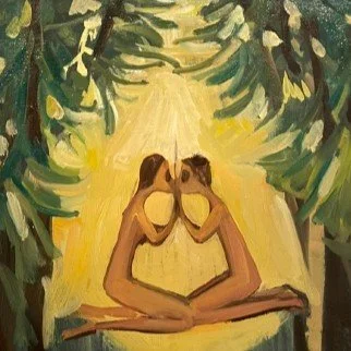 Two women sitting cross-legged in a forest clearing, touching foreheads, surrounded by trees and sunlight.