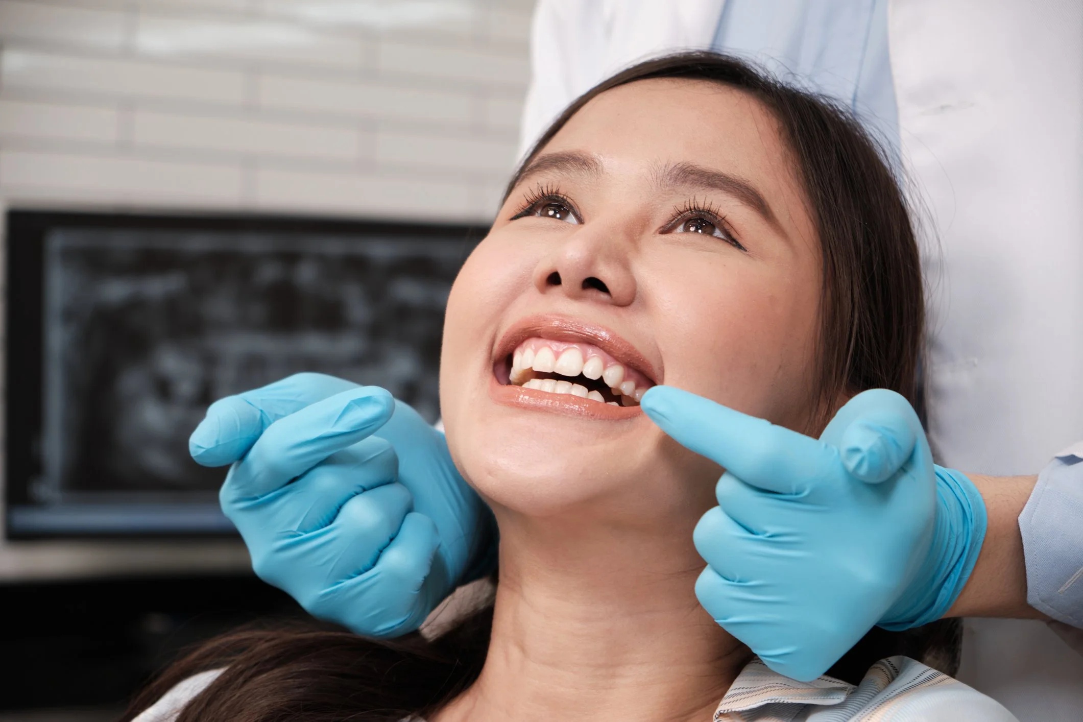 woman smiling at the dentist.jpg