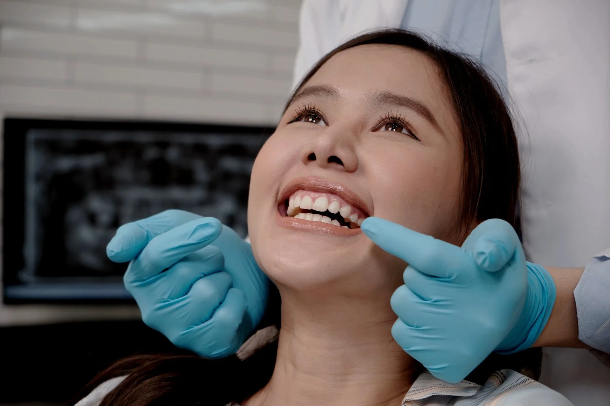 woman smiling at the dentist.jpg