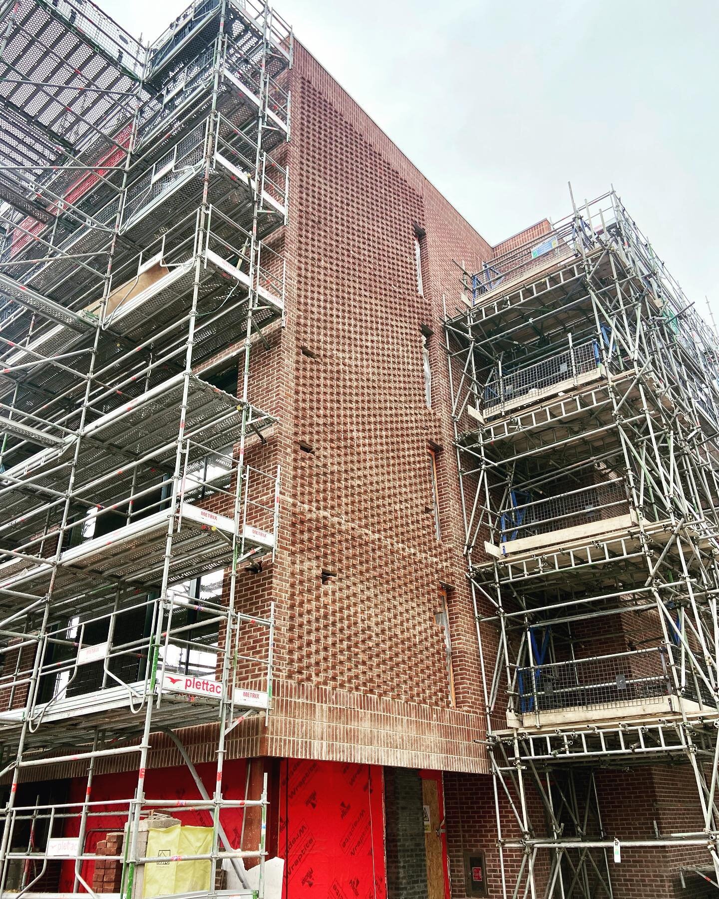 Winnall Flats - site progress.
Projecting header and soldier course stack bond brick detailing progressing.
Stack bond brick slips installed in readiness for sliding solar screen installation.
#construction
#onsite
#winchesterarchitects 
#brickdetail
