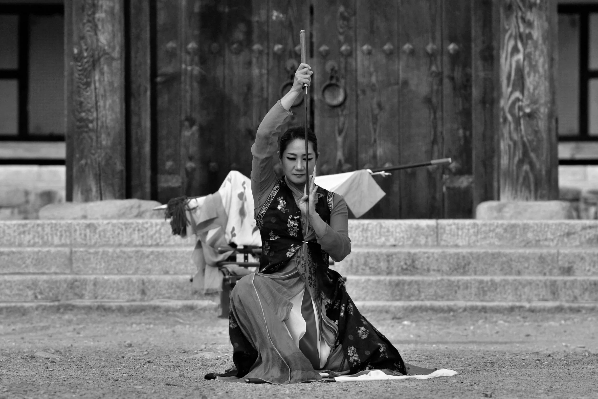 Korean woman sword fighter. Feminine power and grace.