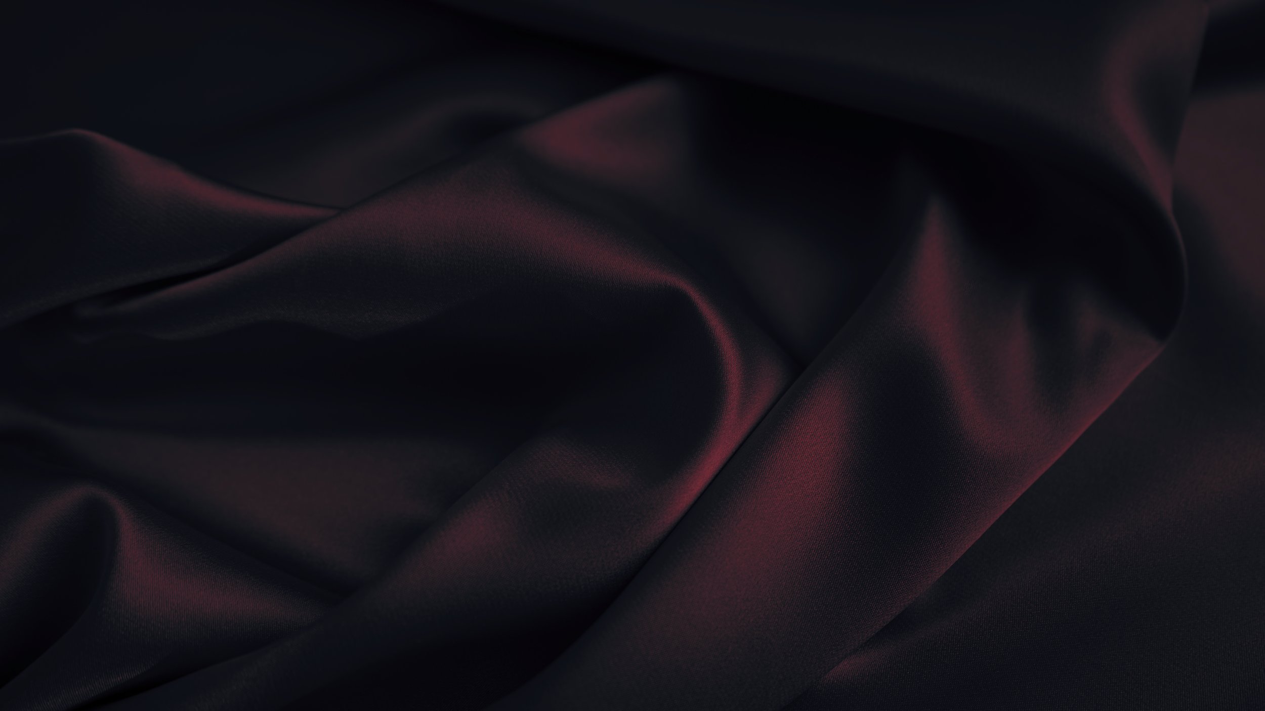 soft, dark-red silk, symbol of  feminine mystery and the deep desire to belong