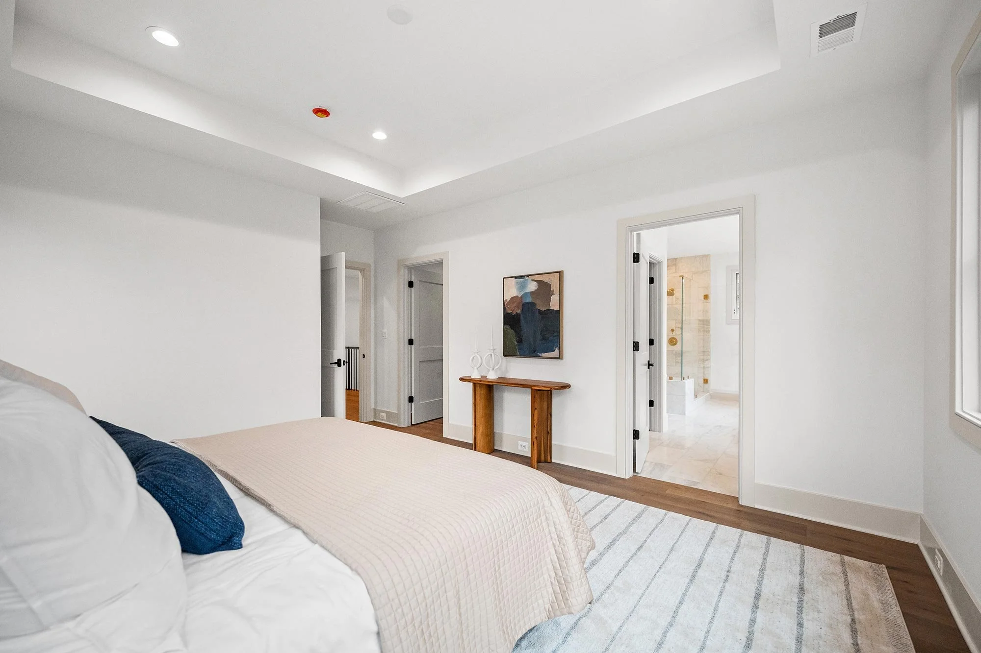 2133-n-oakland-st-primary-bed-to-bath.jpg