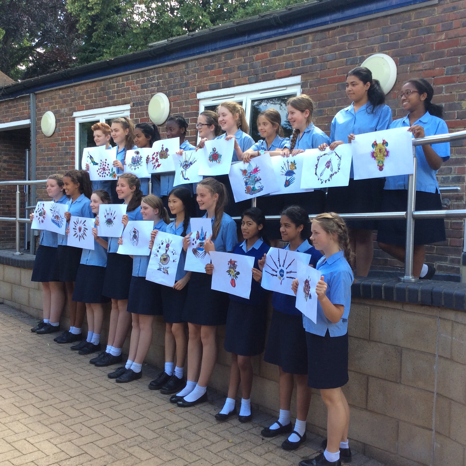 Coloma Convent Girls' School pupils with individual artwork.jpg