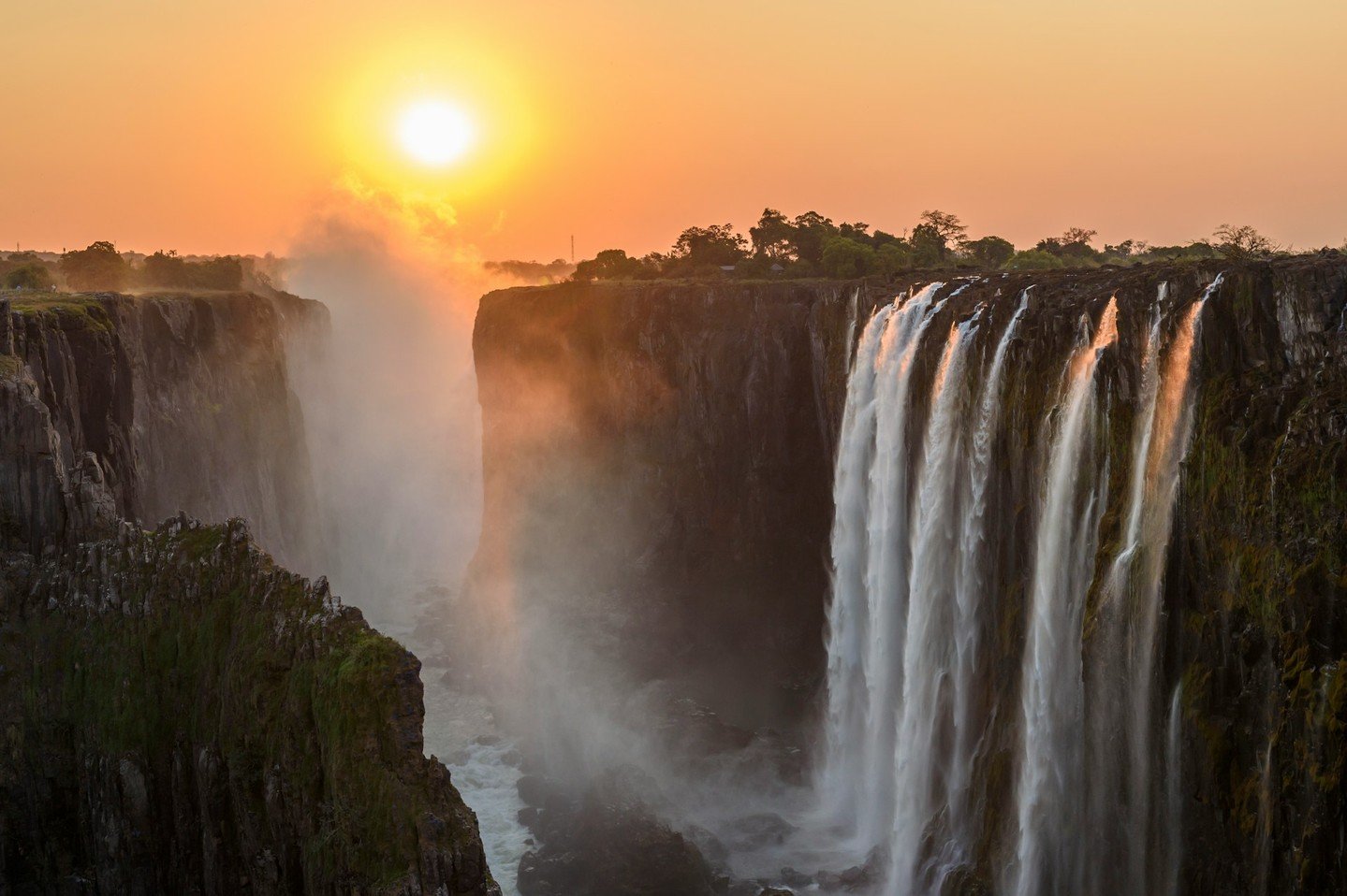 Victoria Falls is one of those places that leaves a lasting impression: thundering water, rising mist, and a landscape shaped by the Zambezi River itself.

Straddling the border of Zambia and Zimbabwe, it&rsquo;s recognized as a UNESCO World Heritage
