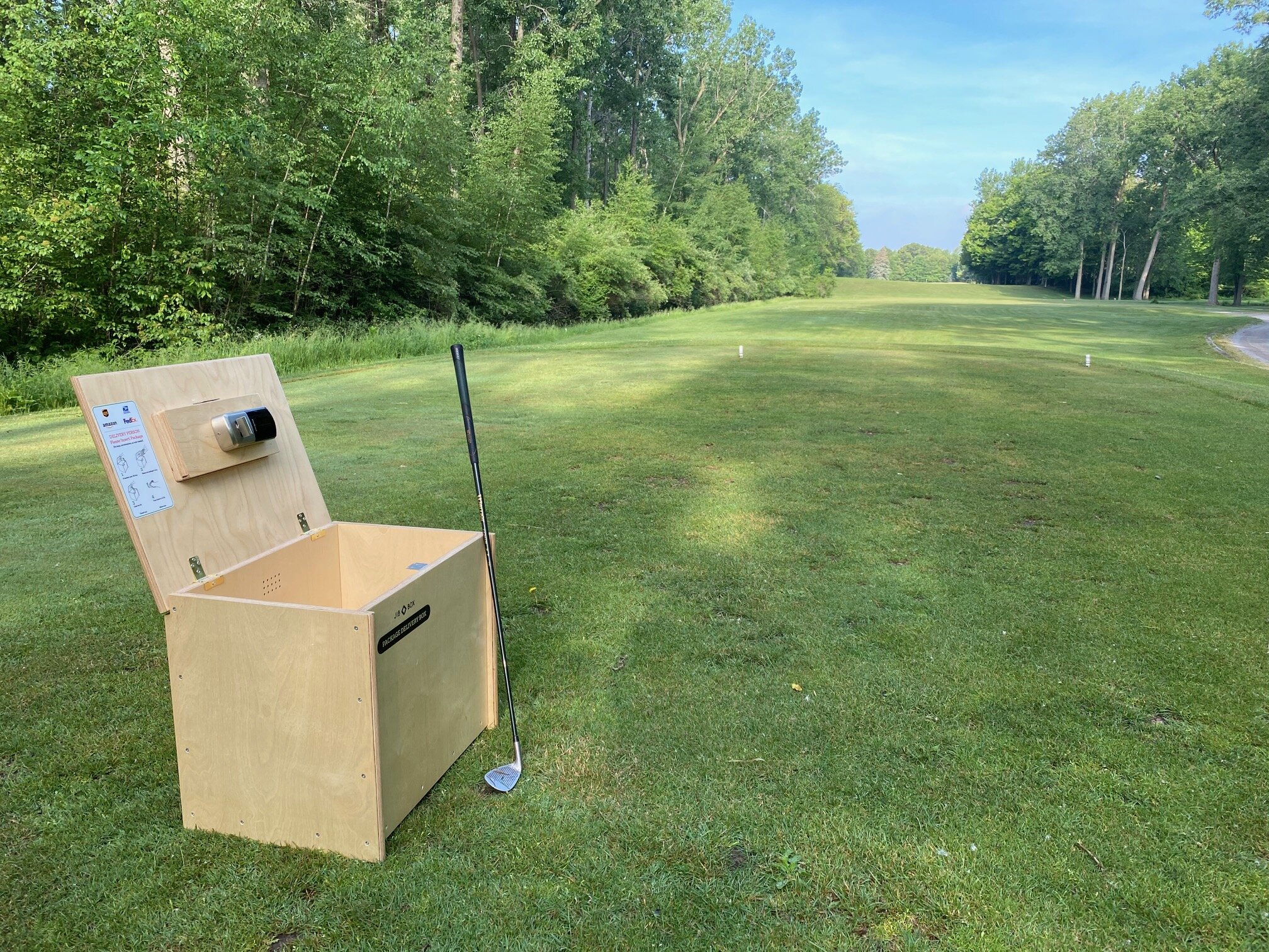 GLBMA Golf Outing 2021 - JIB Box for Chipping Contest (showing more of golf course)2.jpg