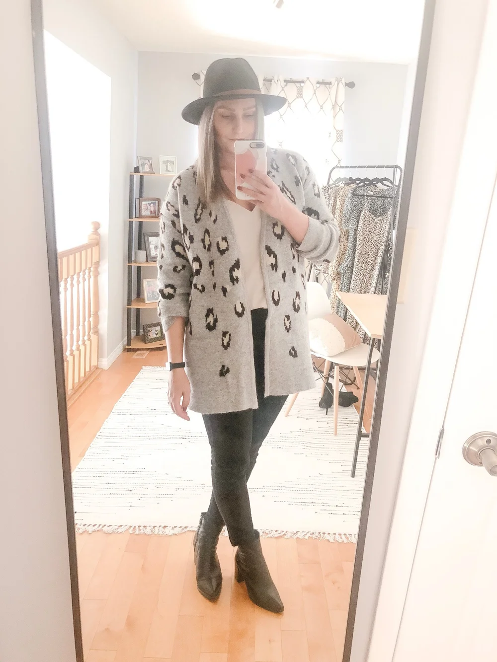 cardigan: Winners    camisole:    Dynamite     jeans: Joe Fresh    boots: Winners    hat: Club Monaco