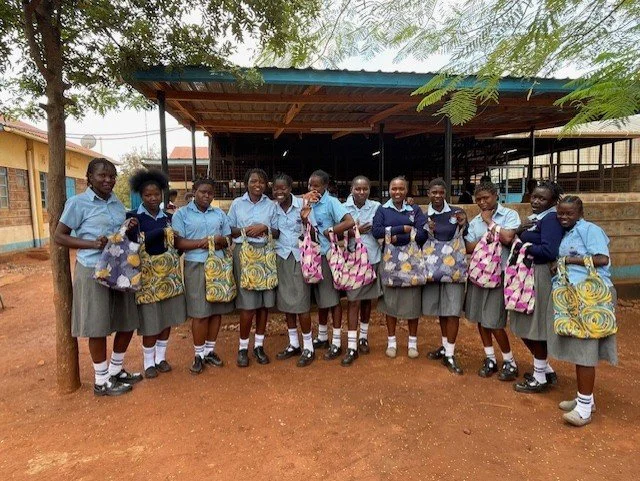 NAJIJALI STUDENTS WITH COMPLETED BAGS.jpg