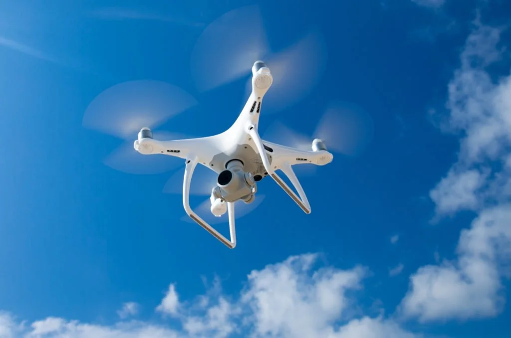 Quadcopter drone flying in the sky