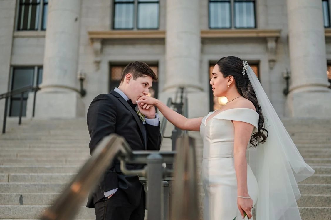Bride and groom sharing a tender moment on courthouse steps, Beverly Hills courthouse wedding photography