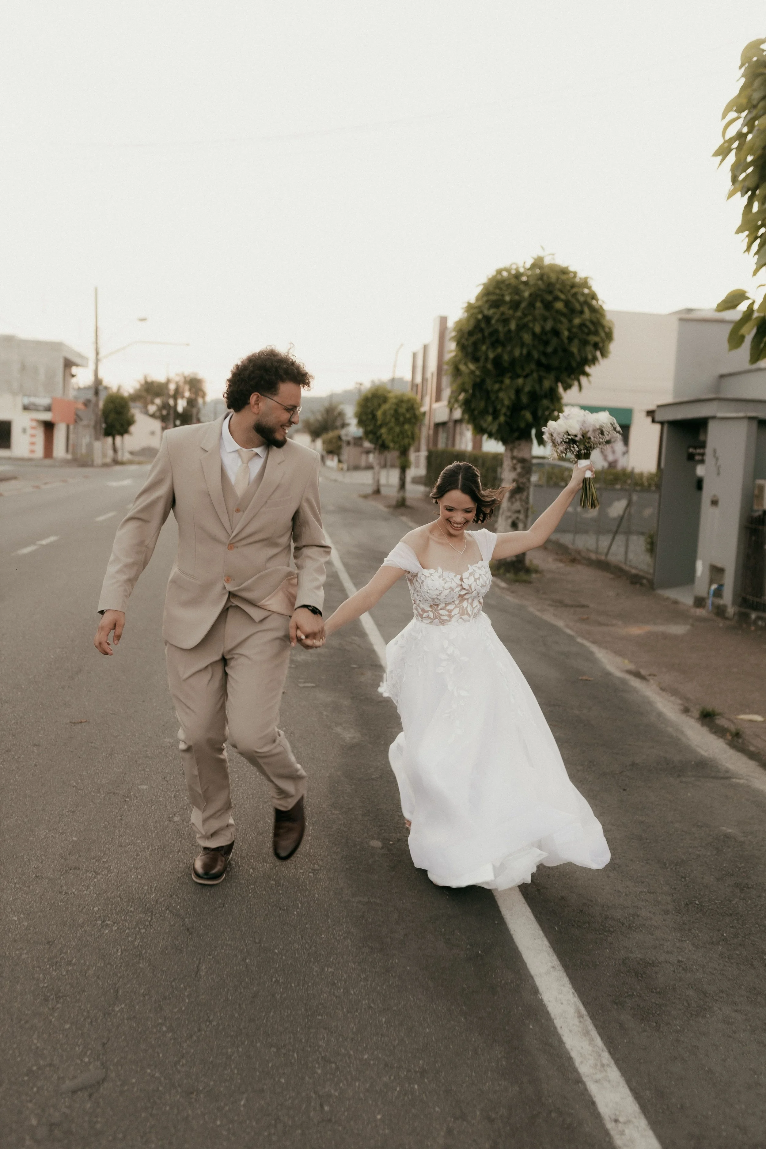 Elopement couple walking together in downtown Los Angeles after their wedding