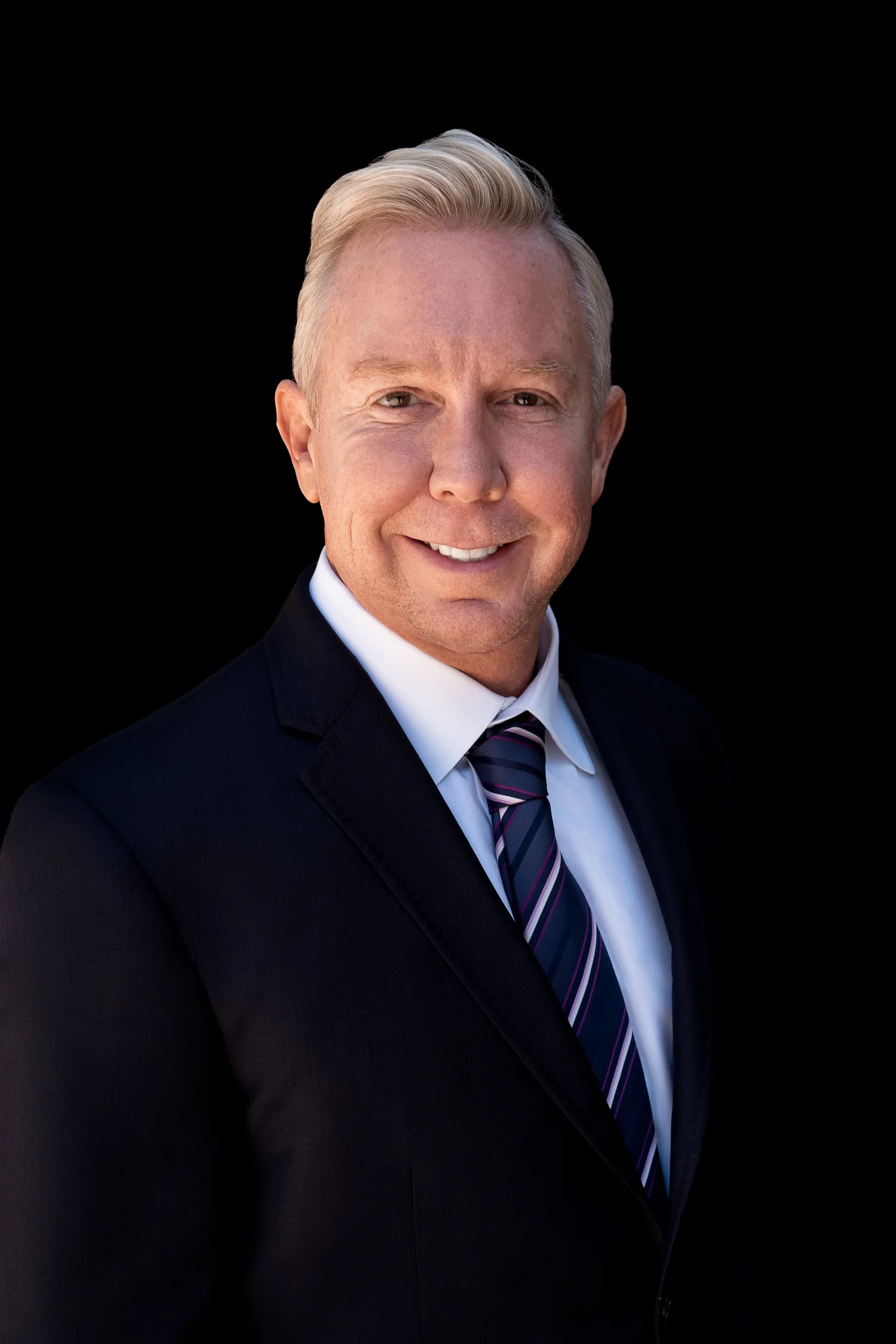 Studio executive headshot of a Los Angeles businessman