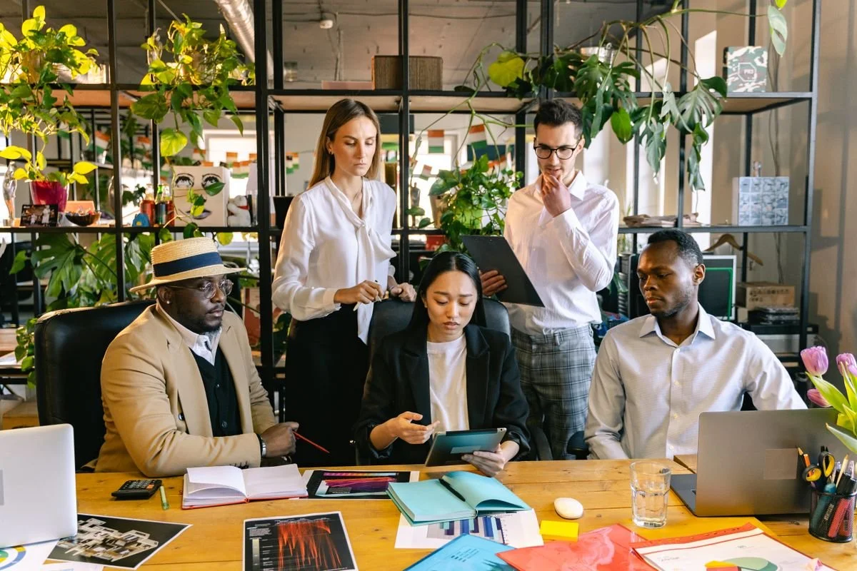 Diverse corporate team collaborating in a Los Angeles office, photographed by a professional corporate photographer