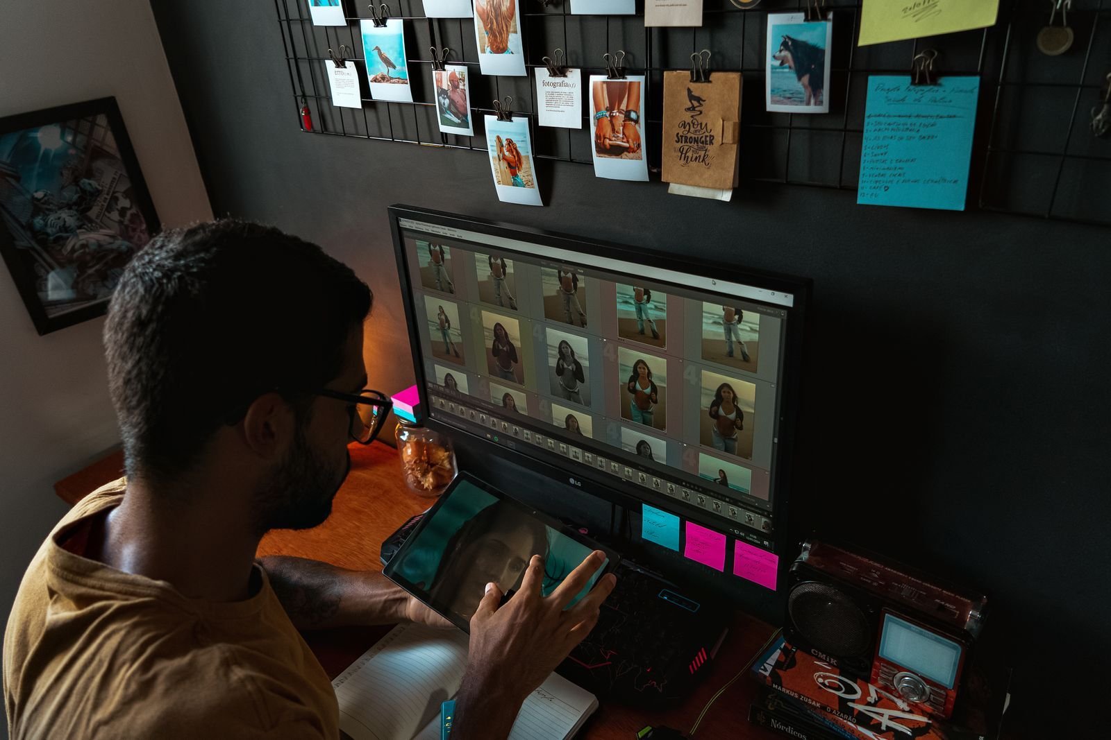 Photographer culling portrait photos on a computer screen, Capture One vs Lightroom organization workflow