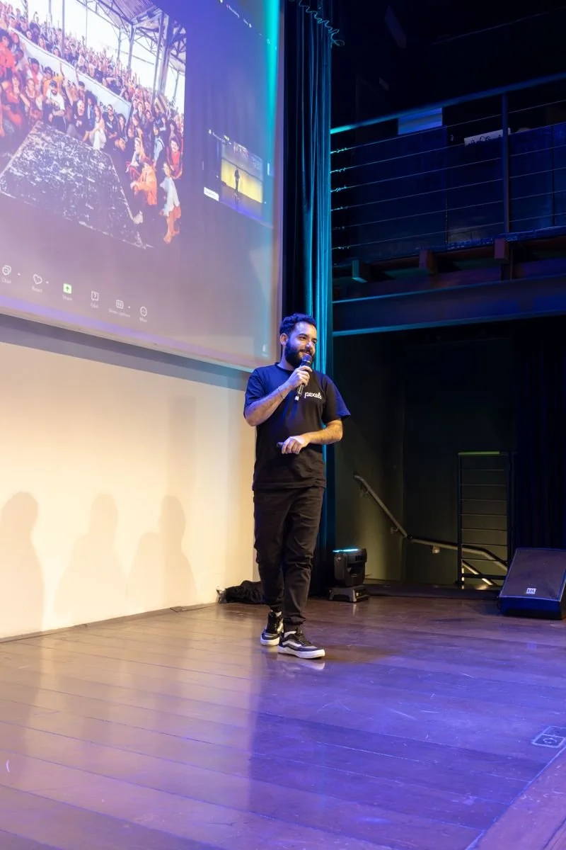Keynote speaker on stage at a corporate conference event