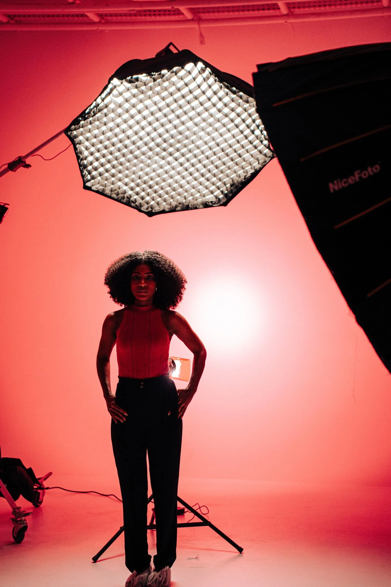 Model lit by a gridded softbox in a one light portrait setup