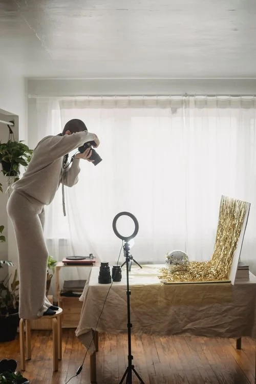 Event photographer photographing party decor and details at a celebration
