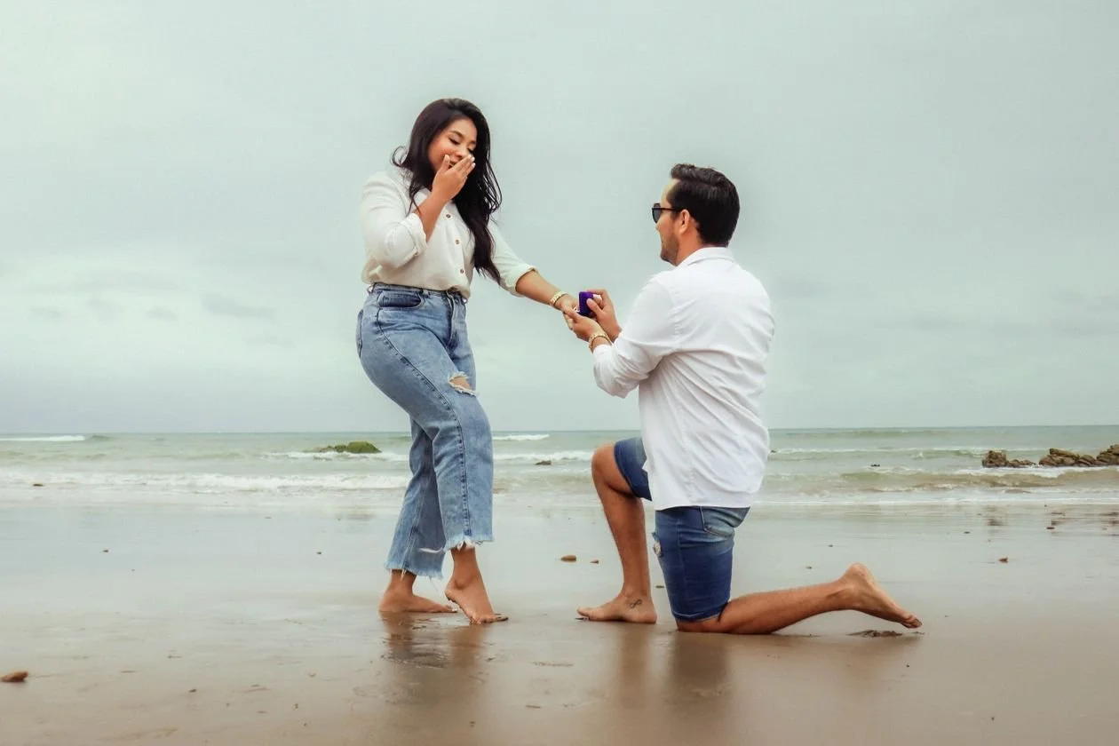 Man proposing on a scenic Los Angeles beach photographed by a proposal photographer