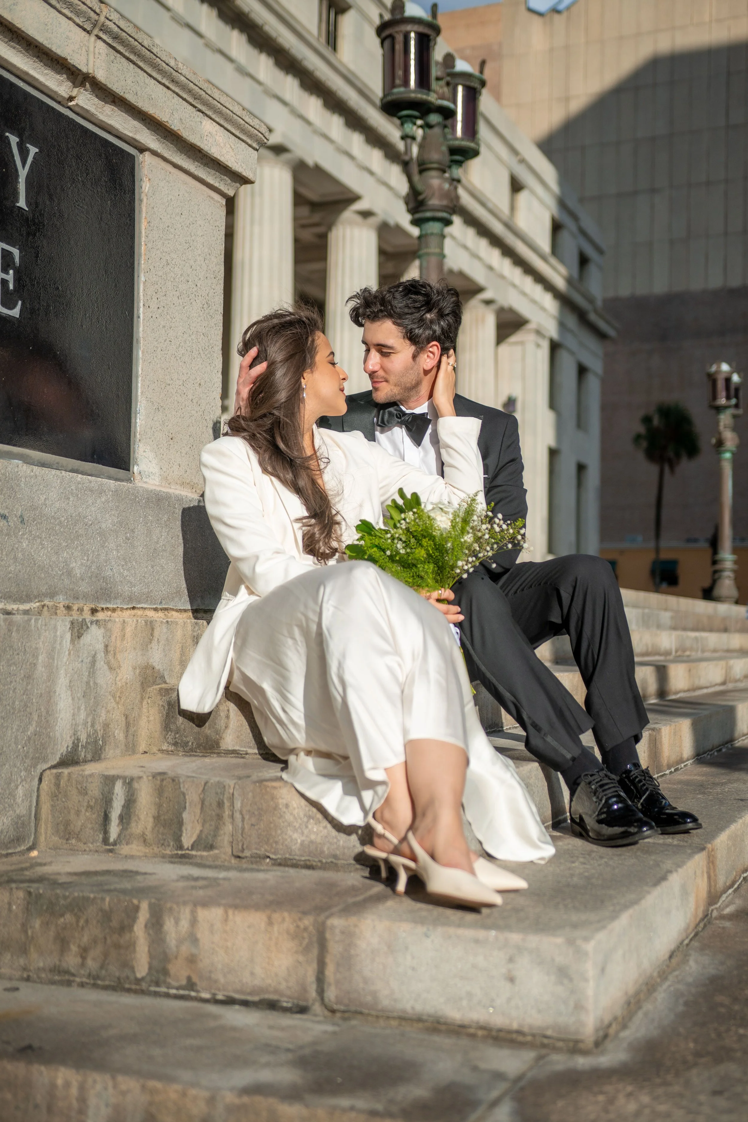 Newly married couple outside a Los Angeles courthouse after their elopement ceremony