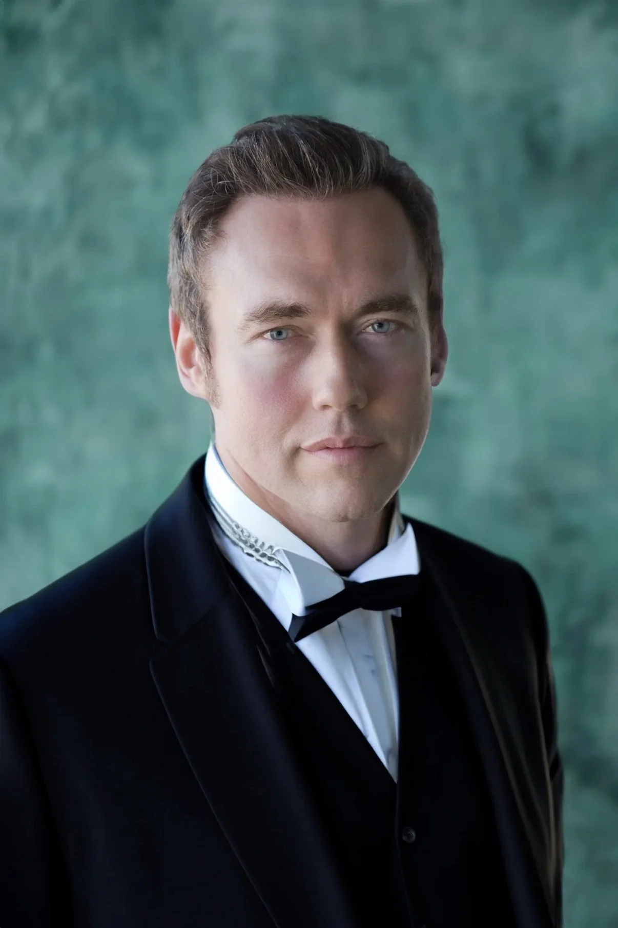 Formal executive portrait of a man in a tuxedo by David Christopher Lee
