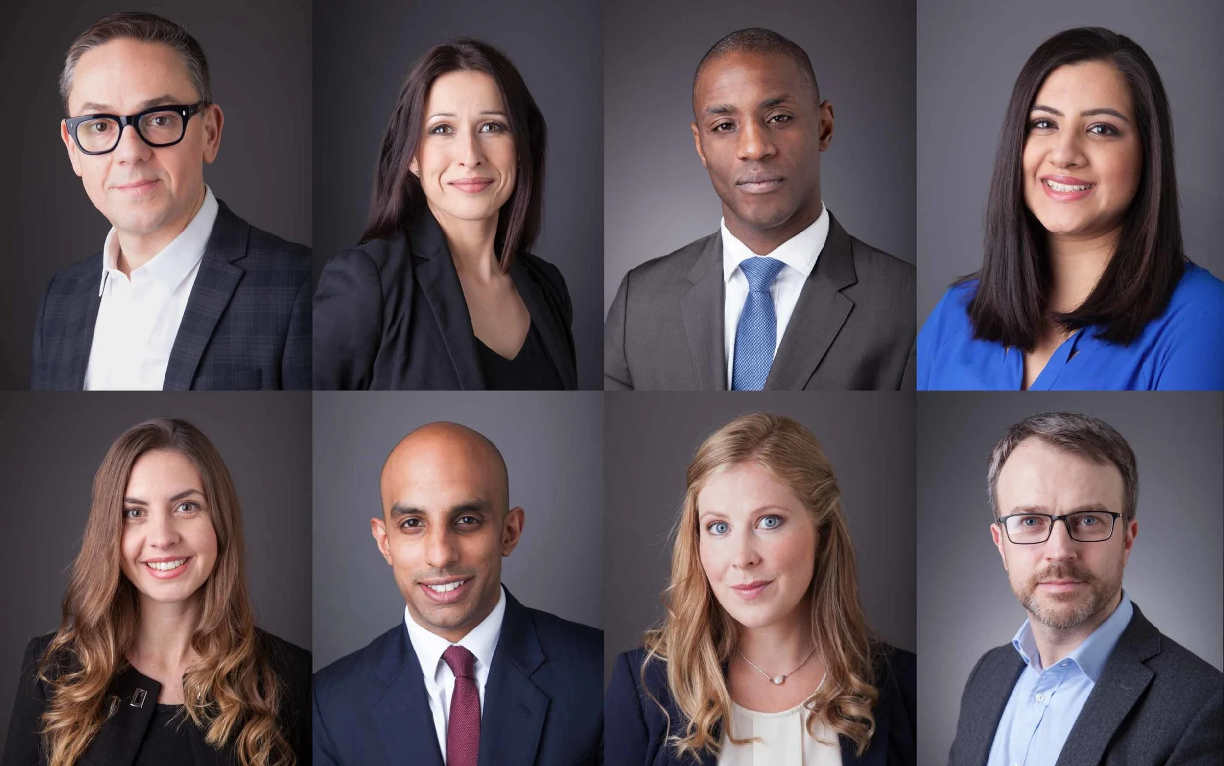 Grid of eight professional corporate headshots of a diverse team on a dark gray studio background
