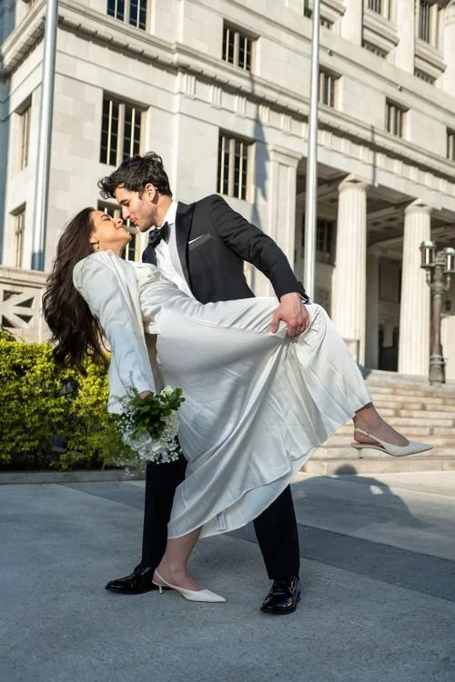 Romantic wedding portrait outside an elegant historic building in Beverly Hills