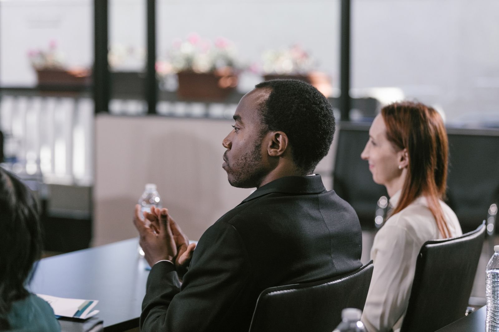 Corporate conference attendees watching a keynote presentation in Los Angeles