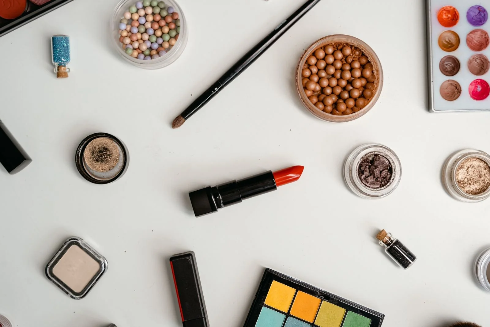 Beauty product flat lay arranged for a cosmetics brand campaign