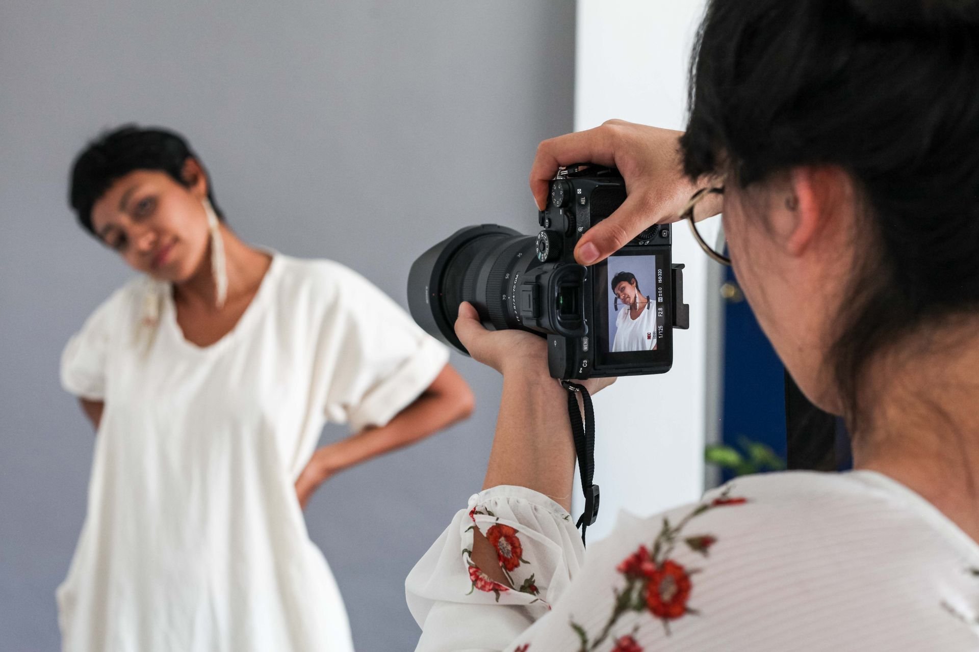 Creative fashion photoshoot in a Los Angeles studio with a digital camera