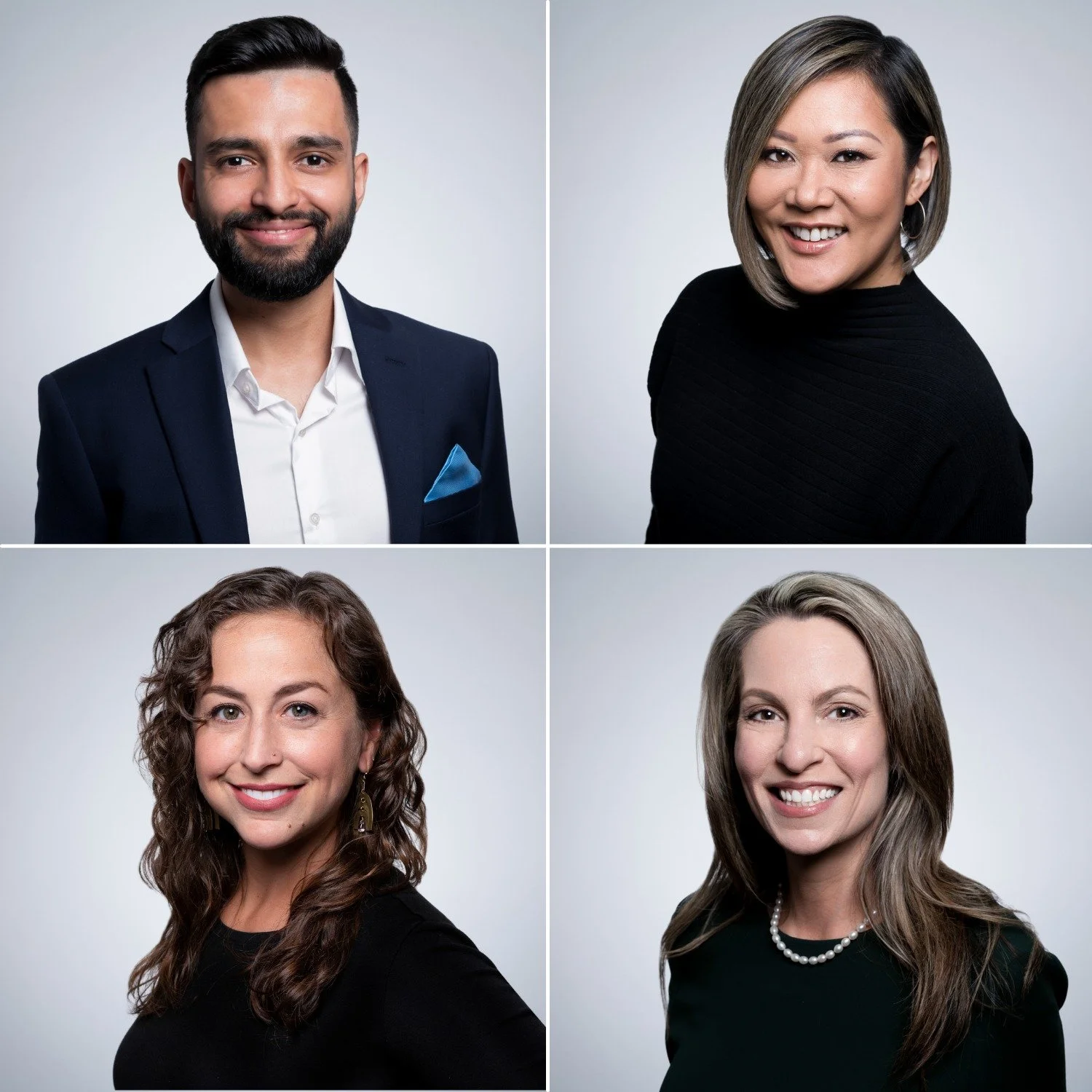 Four matching corporate headshots arranged in a grid on a light gray background, two men and two women in dark professional clothing photographed with identical lighting.