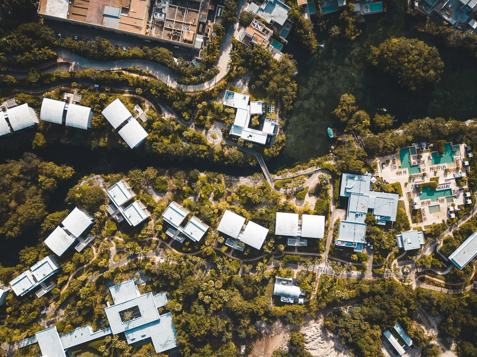 Aerial drone photo of a luxury property and its neighborhood for a real estate listing
