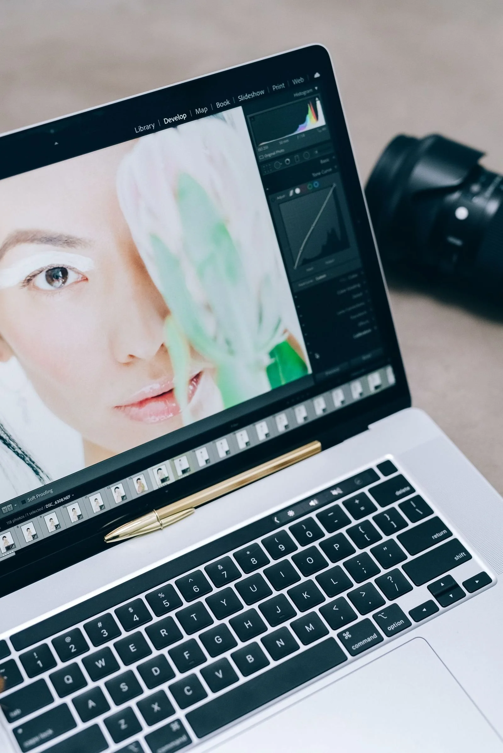 Portrait editing workflow in Lightroom: a beauty portrait open in the Develop module on a laptop