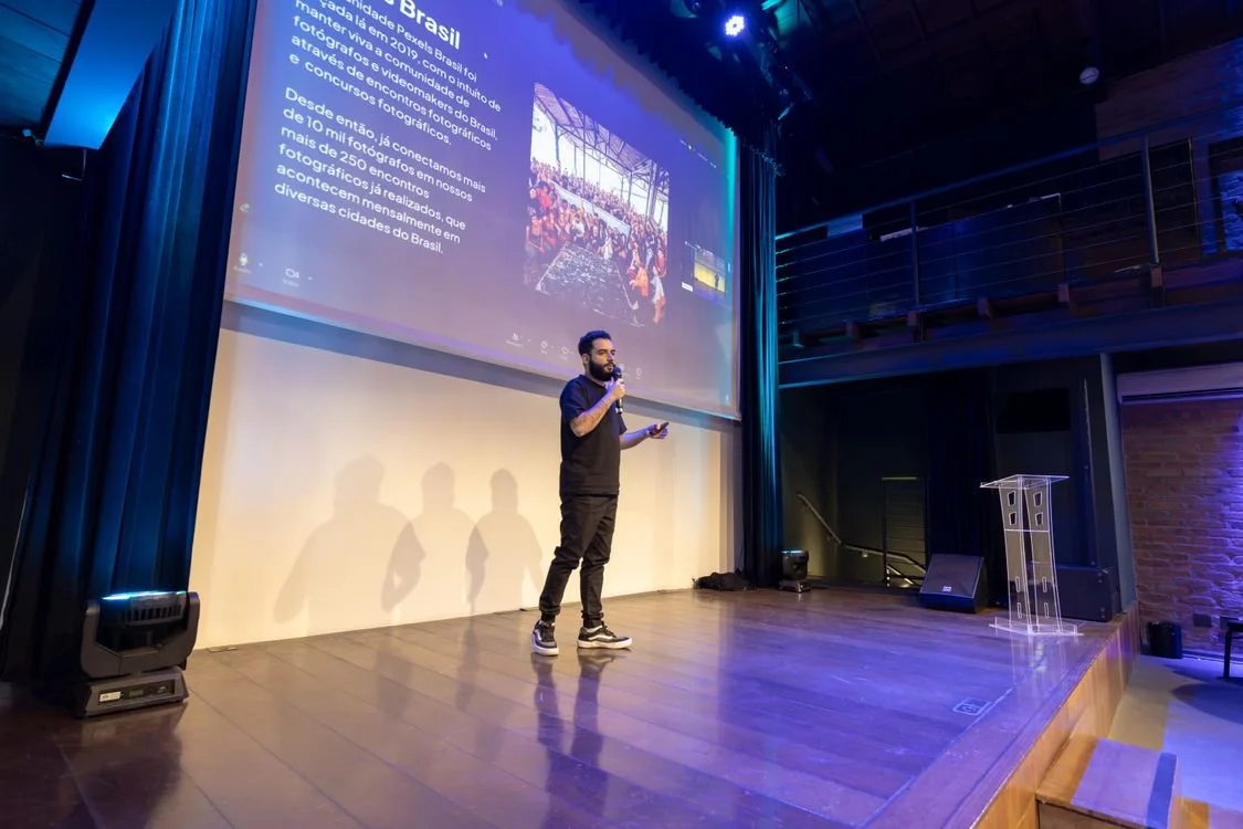 Speaker presenting on stage at a modern Los Angeles conference