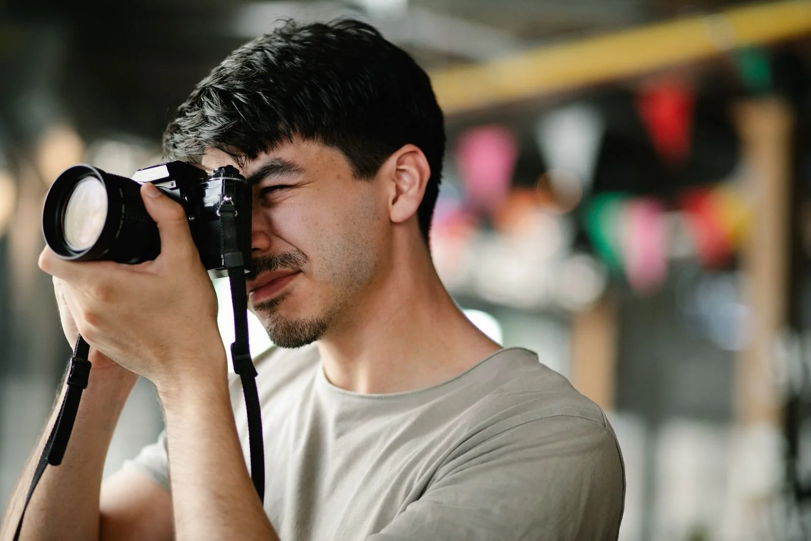 Photographer working on location during an environmental portrait photography session