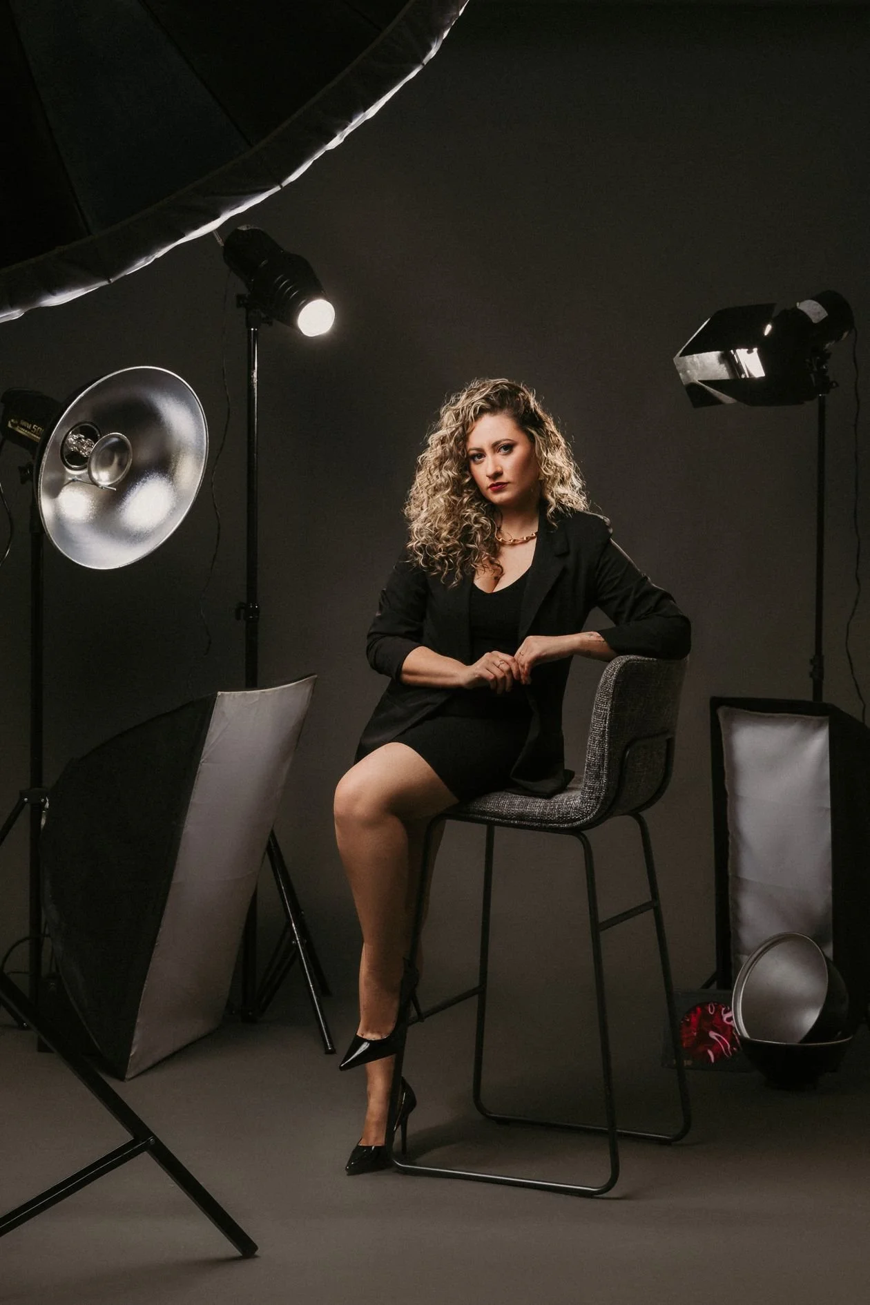 Professional photography studio with multiple strobes during a commercial portrait session