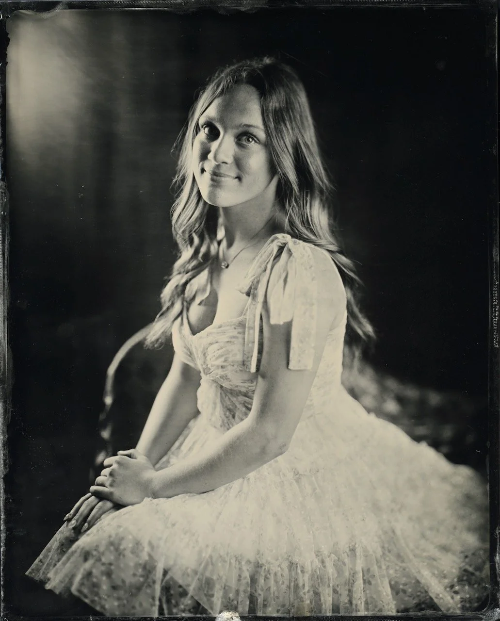 Tintype portrait of a young woman in a tulle dress, wet plate photograph made near Nashville, Tennessee