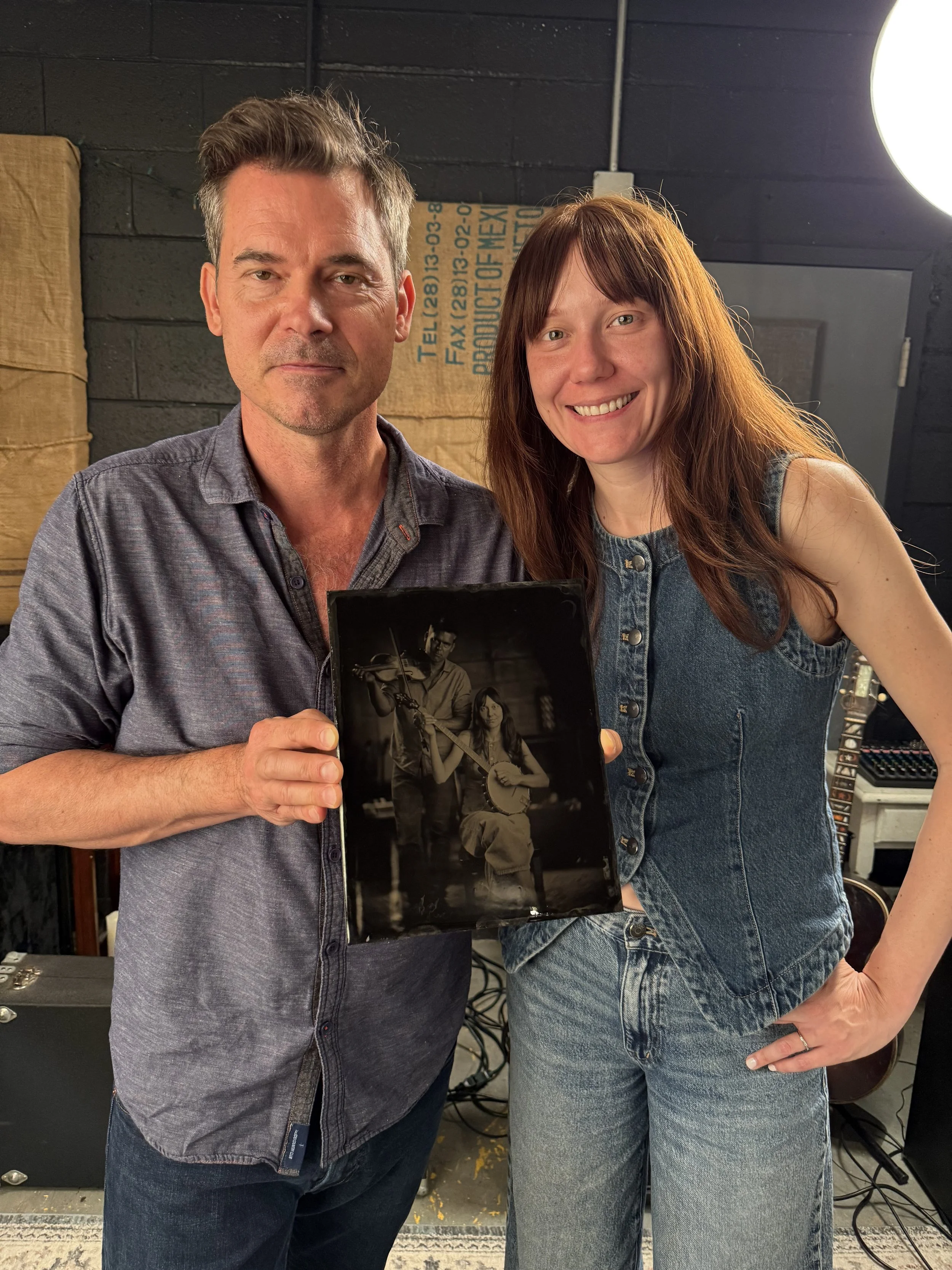 Ketch and Molly holding their finished plate a few minutes after it was made.
