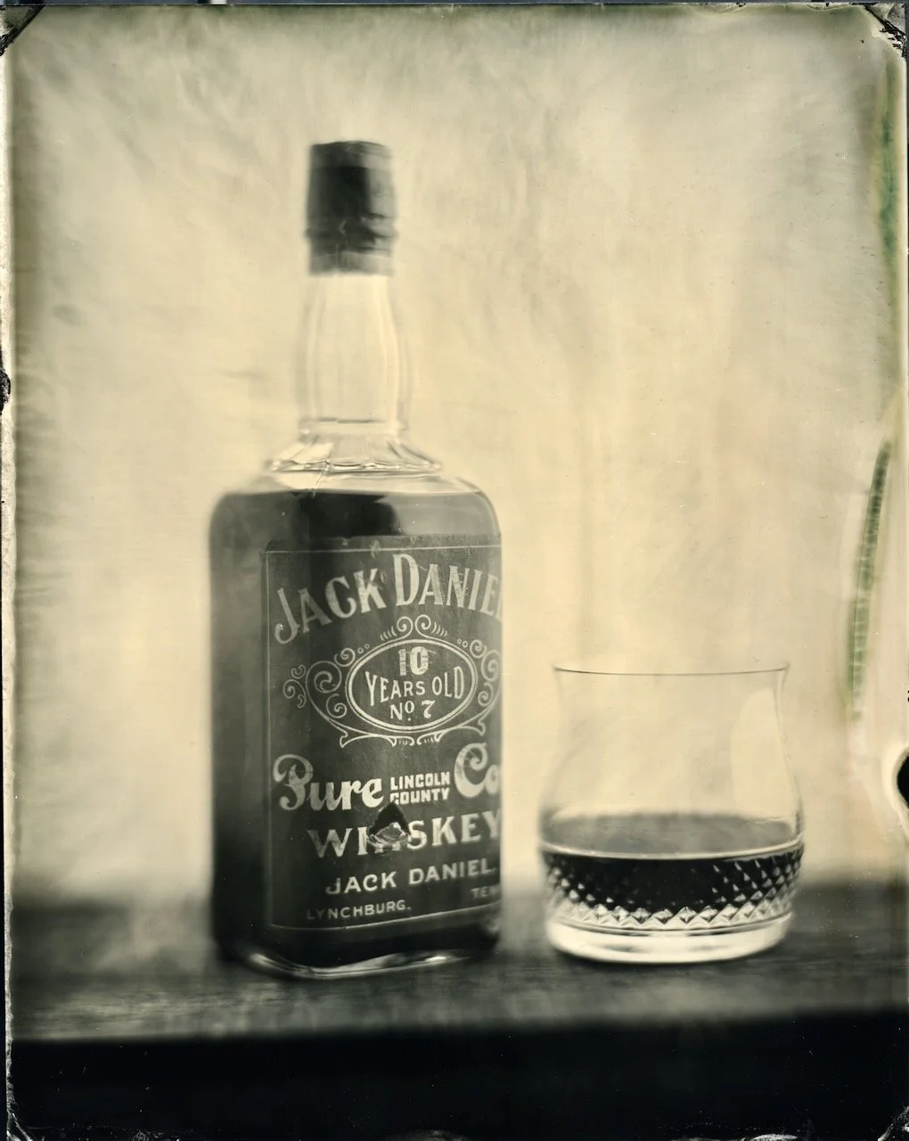 Tintype photograph of an archival Jack Daniel’s Ten Year Old whiskey bottle created by Nashville tintype photographer Blake Wylie.