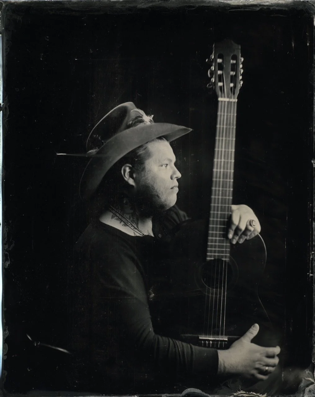 Tintype portrait of Marcus King holding a parlor guitar, from the One Take series by Blake Wylie
