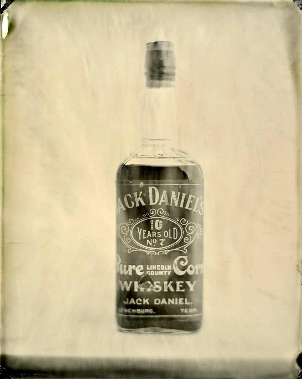 Tintype photograph of an archival Jack Daniel’s Ten Year Old whiskey bottle created by Nashville tintype photographer Blake Wylie.